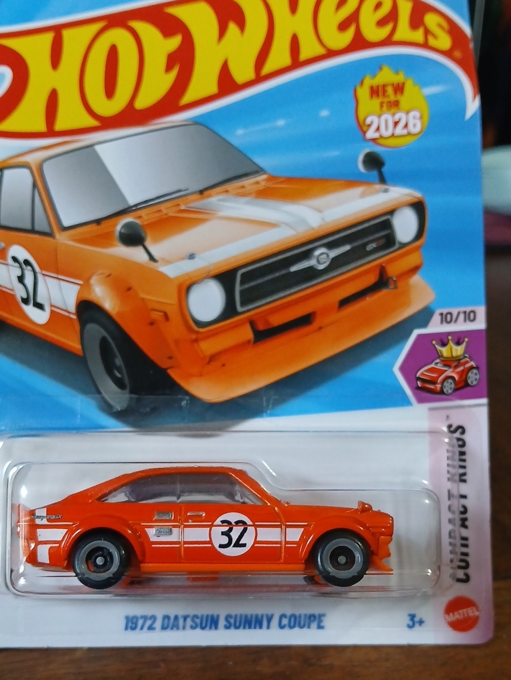 Mattel Hot Wheels Orange 1972 Datsun Sunny Coupe with White Stripes